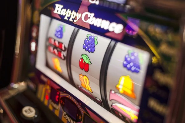 Boom City slot game interface on bugistoto showing reels, stake selector, and account balance